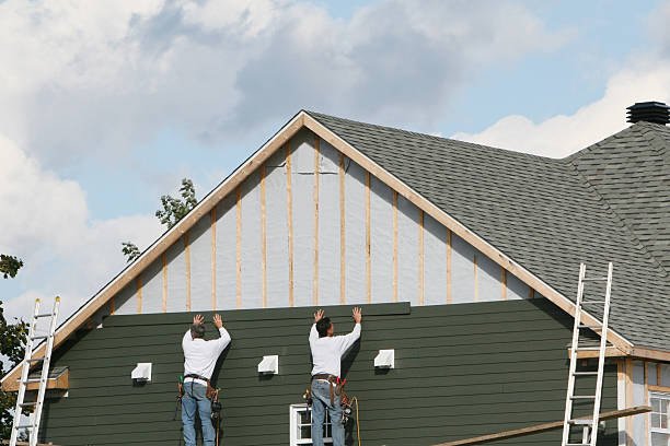 Professional Siding Contractor technician working in Baden, MD